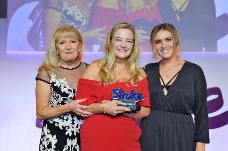 Elizabeth: young woman receives award on stage