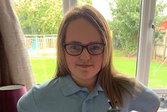 Jasmine in her school uniform