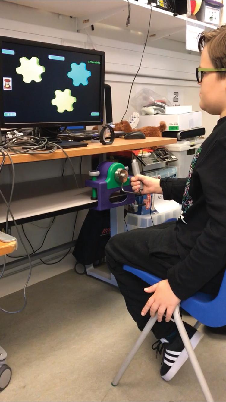 Joey in the computer room at The Children's Trust