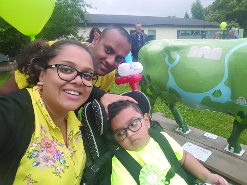 Kai with is family at The Children's Trust