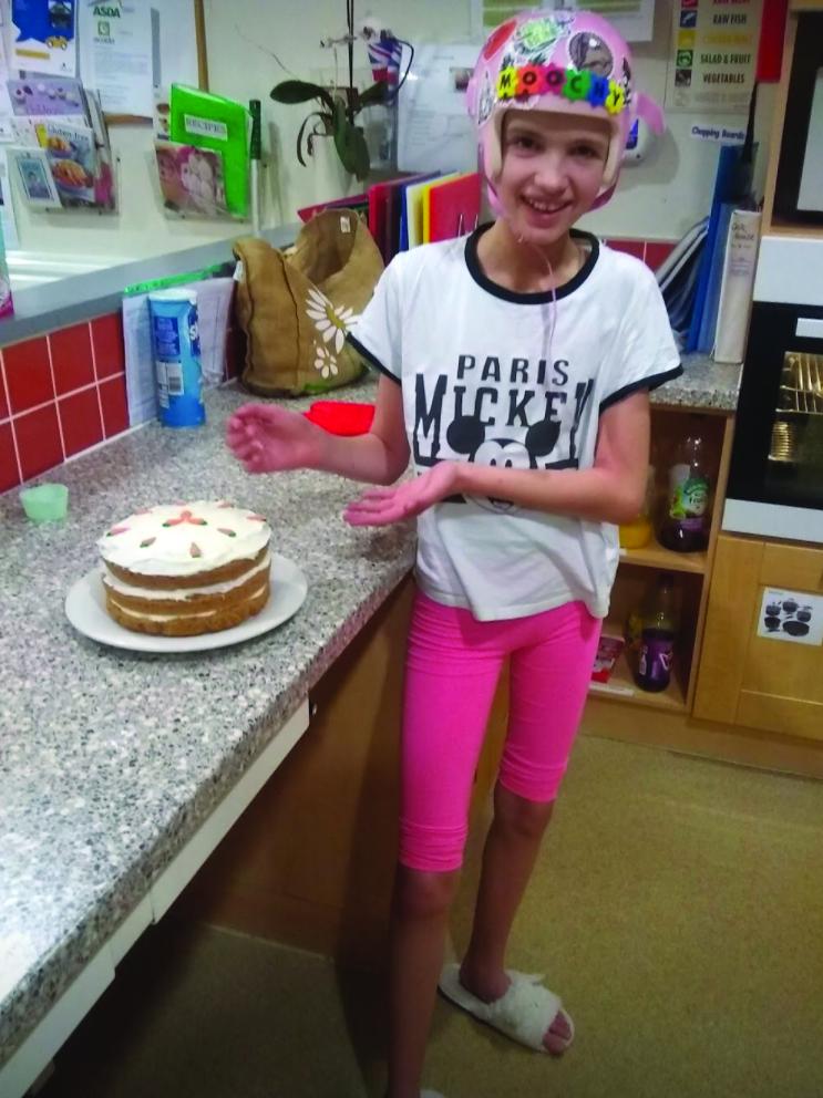 Mia baking a cake
