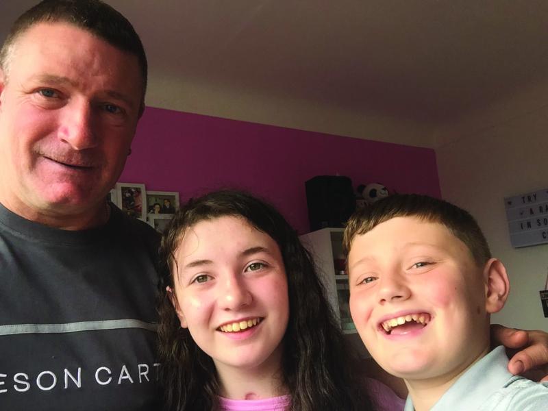 Nieve back at home with her family