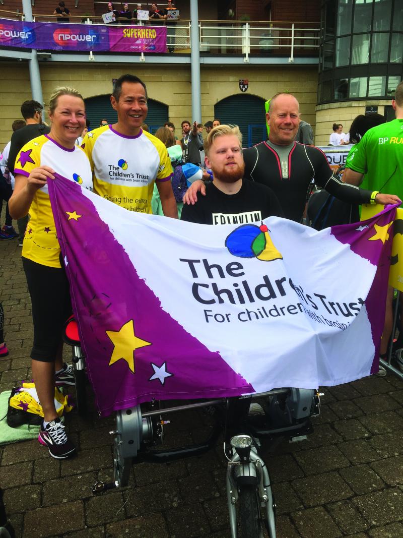 Ryan with his dad and Dalton at Superhero Tri