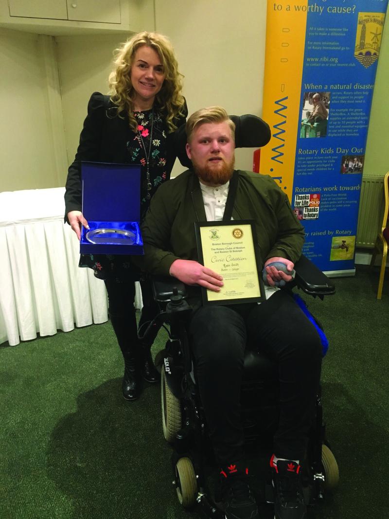 Ryan being presented with an award from Boston Borough Council