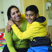 Velstrin with his mum at The Children's Trust