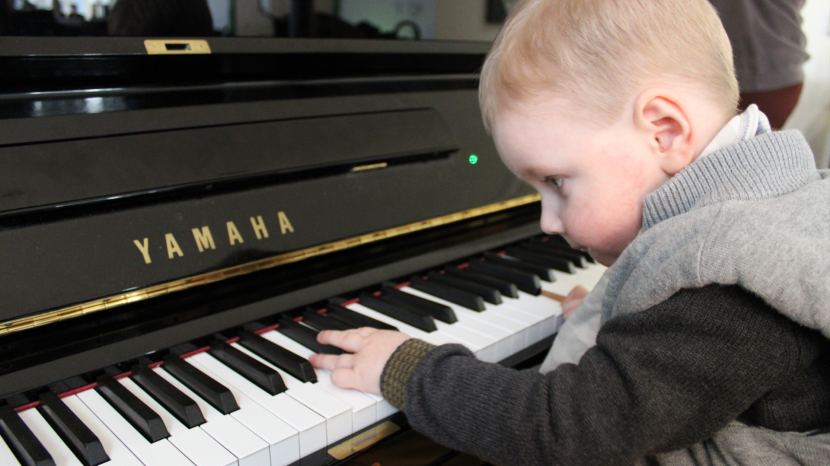 Finn playing the piano